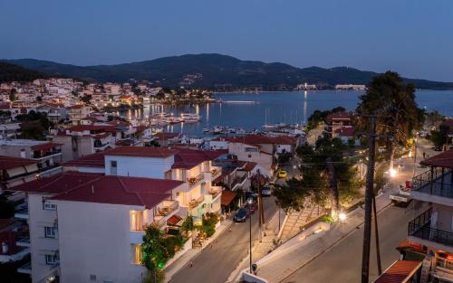 an aerial view of a city with a harbor at Kaplanis House in Neos Marmaras