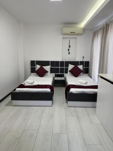 Ένα ή περισσότερα κρεβάτια σε δωμάτιο στο WB Weekend Otel