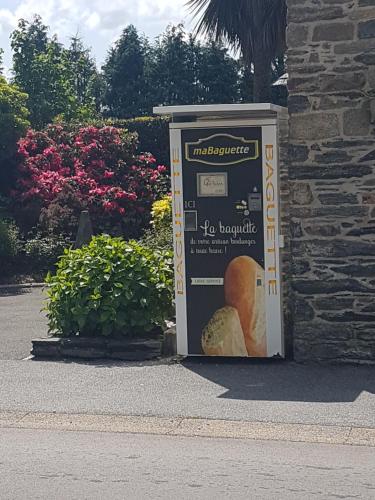 a box that is sitting outside of a building at KerJean in Caurel