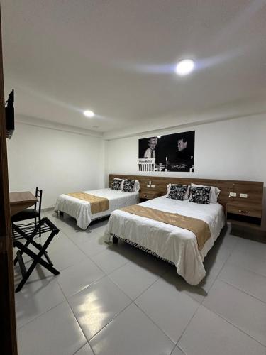 Ένα ή περισσότερα κρεβάτια σε δωμάτιο στο Santander Hotel Boutique