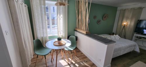Postel nebo postele na pokoji v ubytování La Source Spa Balnéo