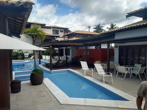 Πισίνα στο ή κοντά στο Praia do Forte Sensacional