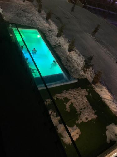 a video game sitting on top of a glass table at Go-Gudauri The Atrium Residence in Gudauri