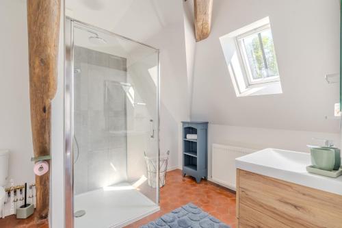 a bathroom with a shower and a sink at La Roseraie - Disney 30 minutes in Saint-Augustin
