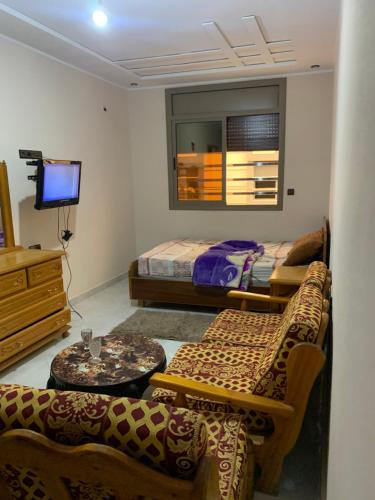 Et opholdsområde på Studio au deuxième étage, résidence almohade