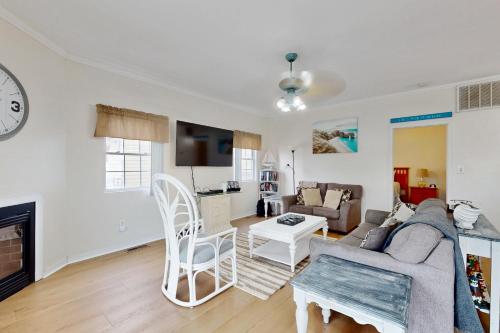 a living room with a couch and a table at Bayside View in Ocean City