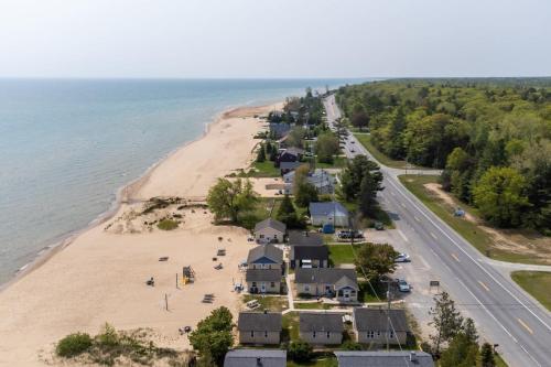 an aerial view of a house on the beach at Light-Filled Near the Shore in Oscoda