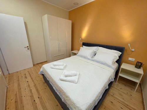 Giường trong phòng chung tại Central Bliss Apartments No2