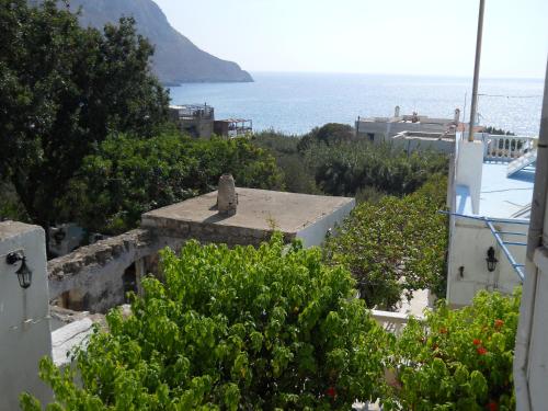 a view of the ocean from a house at Alkyonis Apartments in Panormos Kalymnos