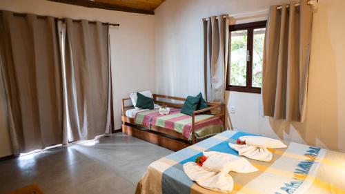 Cama ou camas em um quarto em Vila Alemã