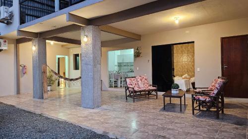 Et opholdsområde på Suítes Recanto Praia Grande