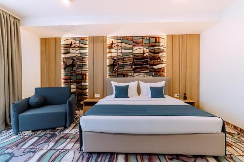 Postel nebo postele na pokoji v ubytování ARIS Boutique Hotel & SPA