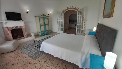 Postel nebo postele na pokoji v ubytování Hotel Il Vascello