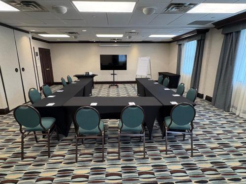 a large conference room with a long table and chairs at Homewood Suites by Hilton Toronto Mississauga in Mississauga