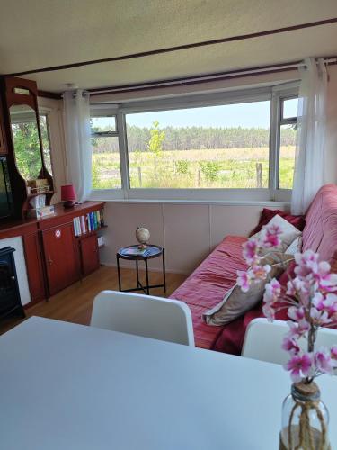 Postel nebo postele na pokoji v ubytování Agréable mobil home