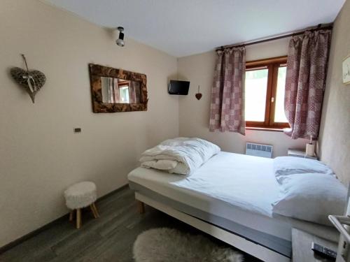 Posteľ alebo postele v izbe v ubytovaní Résidence Chamoisiere - Appartement spacieux pour 6/7 personnes MAE-8304