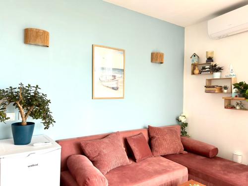 Et opholdsområde på Sunny Paradise Apartment