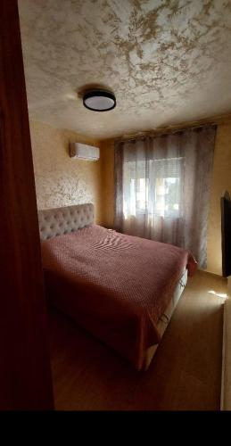 Llit o llits en una habitació de Apartment MJ