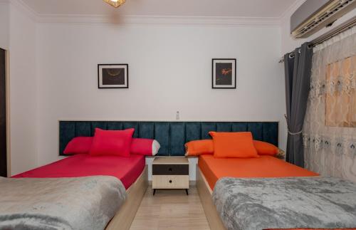 Ένα ή περισσότερα κρεβάτια σε δωμάτιο στο Aldora resident Hurghada