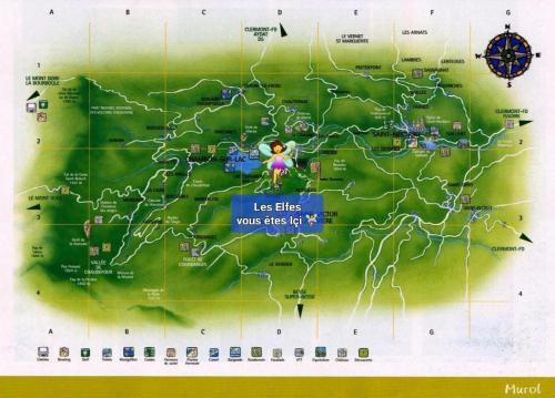 a map with a woman on a map at Gîte Frimousse les elfes in Murol