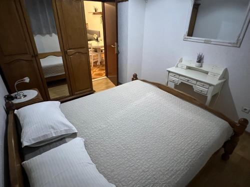 Postel nebo postele na pokoji v ubytování Apartman Mia
