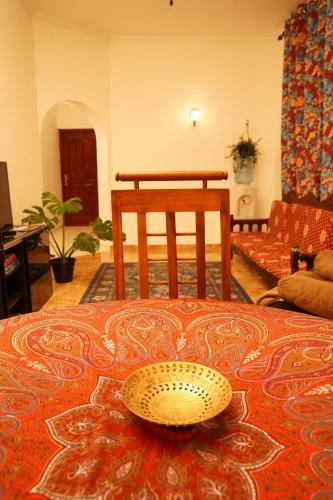a living room with a bowl on a table at House of Sincerity in Maharagama