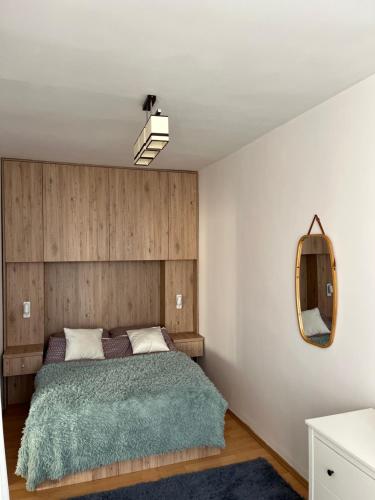 Ένα ή περισσότερα κρεβάτια σε δωμάτιο στο Apartament przy Sprzymierzeńców 8, Ustka