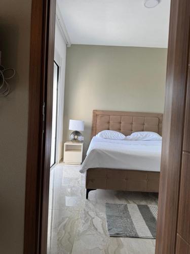 Una cama o camas en una habitación de Best Apartments