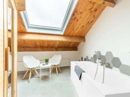 Posezení v ubytování Attractive holiday home in Gorp and Roovert estate
