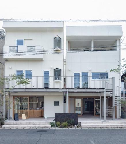 a large white building with a balcony on it at noma - Vacation STAY 21501v in Gifu