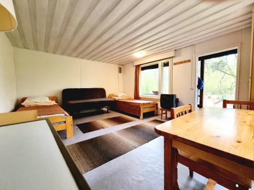 Ένα ή περισσότερα κρεβάτια σε δωμάτιο στο Raasepori camping