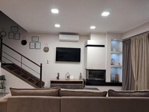 Double-V apartmentにあるテレビまたはエンターテインメントセンター