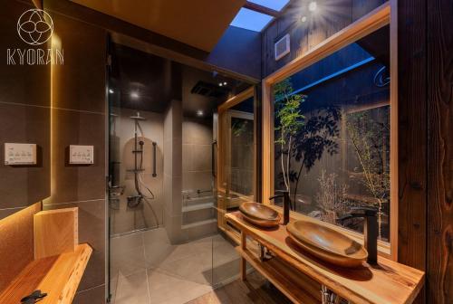 a bathroom with two sinks and a shower at Kyoran-Gion Residence - Vacation STAY 09383v in Gionmachi