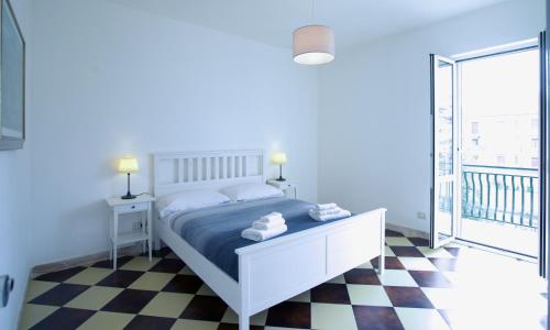 Ένα ή περισσότερα κρεβάτια σε δωμάτιο στο +61 Lounge Apartment