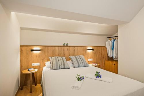 Postel nebo postele na pokoji v ubytování Lenikos Resort