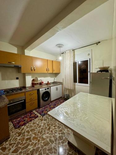 Η κουζίνα ή μικρή κουζίνα στο Appartement Vue Mer Tamraght