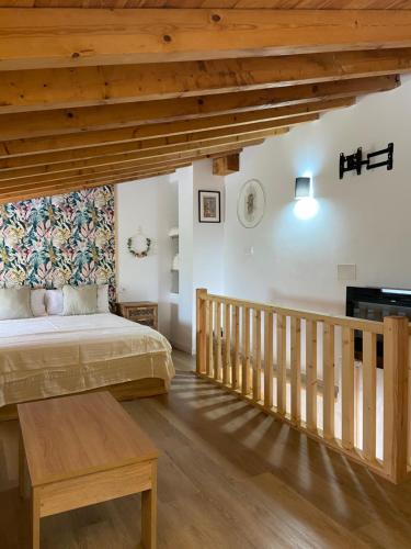 Postel nebo postele na pokoji v ubytování Posada La Fontana