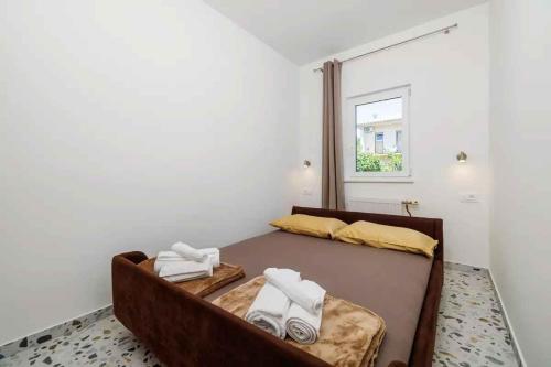 Posteľ alebo postele v izbe v ubytovaní Apartment in Novi Vinodolski 15435