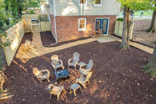 an aerial view of a patio with chairs and a table at Hot Tub Fire Pit Oasis 3mi to Downtown in Raleigh