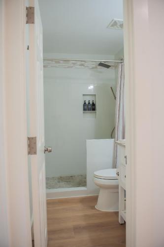 a bathroom with a toilet and a shower at Family Tides in Destin