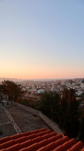 a view of a city from the top of a building at Periopto Maisonette House in Mastambás