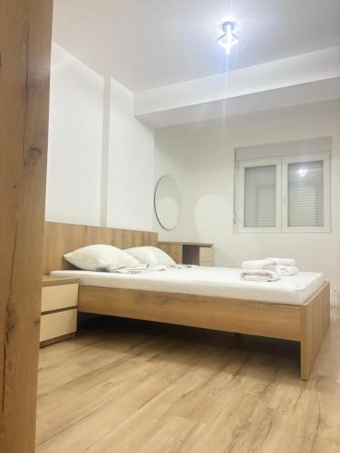 Ένα ή περισσότερα κρεβάτια σε δωμάτιο στο TIKI Lux Gevgelija