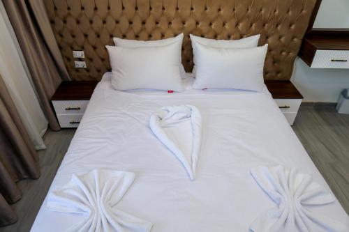 Cama o camas de una habitación en AMADEOS pyramids inn