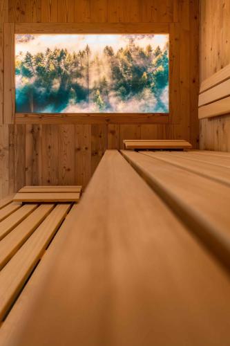 an empty room with a window in a wooden cabin at Apartment in Lam - Bayerischer Wald 50007 in Lam