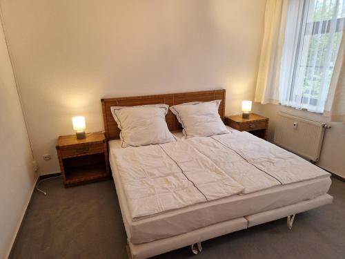 Postel nebo postele na pokoji v ubytování Gästezimmer North Carolina in Chemnitz