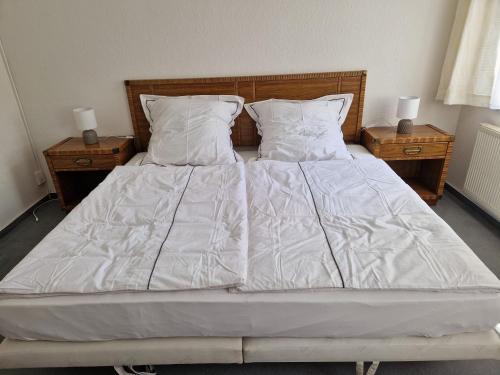 Postel nebo postele na pokoji v ubytování Gästezimmer North Carolina in Chemnitz