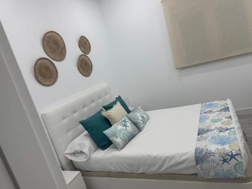 Postel nebo postele na pokoji v ubytování Apartamentos bajo de guía