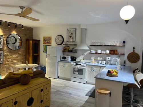 a kitchen with white appliances and a counter top at Park Slope New Pvt 2 bdrm in Brooklyn
