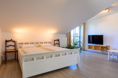 Postel nebo postele na pokoji v ubytování Ferienwohnung Chiemgauglück