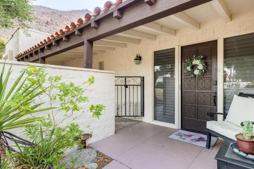 a porch of a house with a black door at 2 Mi to Galleta Meadows Desert Golf Retreat! in Borrego Springs